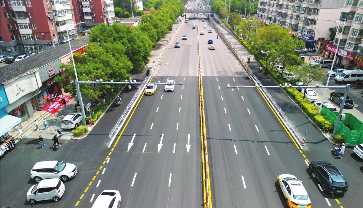 针对地道桥防汛难题沈阳修筑“路面驼峰”挡水